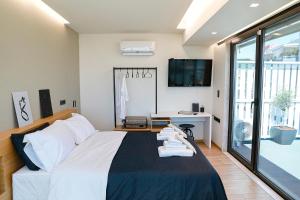 Posteľ alebo postele v izbe v ubytovaní The First Key Luxury & small apartment in the center of Xanthi