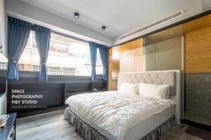 Voodi või voodid majutusasutuse Yi Piao B&B toas