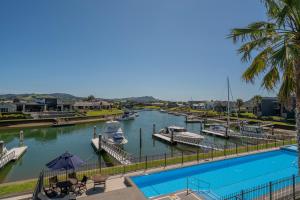 a view of a marina with boats in the water at Waterways Serenity in Whitianga
