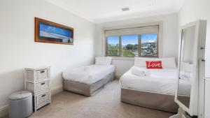 מיטה או מיטות בחדר ב-Unit 49 - 3 Bed Ocean View