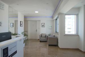 an office with a hallway with a waiting room at Phaedrus Living: Luxury Suite Nicosia 503 in Nicosia