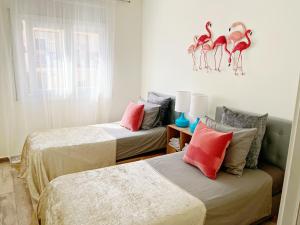 Postel nebo postele na pokoji v ubytování Cheerful Townhouse Center Sitges 5 bedrooms Pool and Terrace