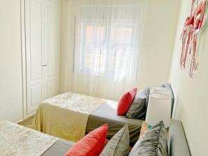 Postel nebo postele na pokoji v ubytování Cheerful Townhouse Center Sitges 5 bedrooms Pool and Terrace