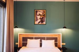 Postel nebo postele na pokoji v ubytování Wine Rock Hotel