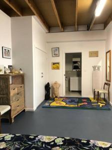 a room with a kitchen with a large rug on the floor at H&H studio overlooking Boston Bay, Port Lincoln in Port Lincoln