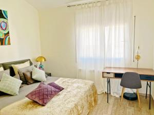Postel nebo postele na pokoji v ubytování Cheerful Townhouse Center Sitges 5 bedrooms Pool and Terrace