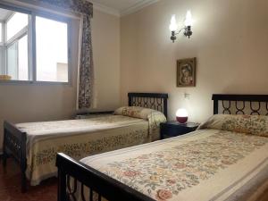 Posteľ alebo postele v izbe v ubytovaní Apartamento panorámico beach Fuengirola