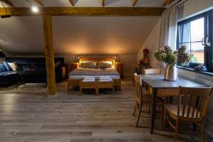Postel nebo postele na pokoji v ubytování HORTUS apartament z klimatyzacją