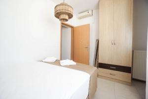 Posteľ alebo postele v izbe v ubytovaní Urban Beach Studio