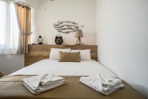 Posteľ alebo postele v izbe v ubytovaní Urban Beach Studio