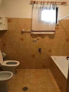 Ванная комната в Big apartment Ovindoli