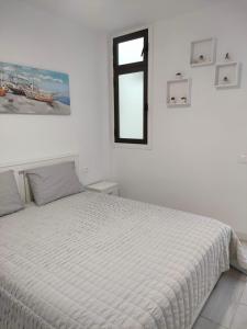 Postel nebo postele na pokoji v ubytování Bonny House Los Cristianos Sea View Free Wifi