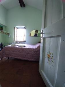 Postel nebo postele na pokoji v ubytování Tottavilla Affittacamere