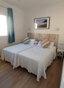 A bed or beds in a room at Casa Efraim