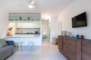 Η κουζίνα ή μικρή κουζίνα στο Casa Cocó, Corralejo +25 φωτογραφίες