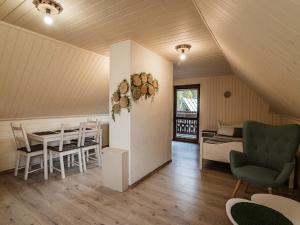 Posedenie v ubytovaní Apartamenty na wzgórzu + 32 fotografií