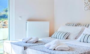 Postel nebo postele na pokoji v ubytování Villa Di Giorgio Heated Pool