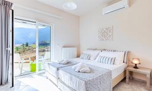 Postel nebo postele na pokoji v ubytování Villa Di Giorgio Heated Pool