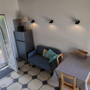 Χώρος καθιστικού στο Le petit gîte d'Angélique