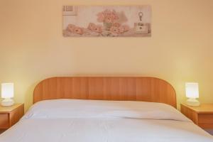 Posteľ alebo postele v izbe v ubytovaní San Carlo - private beach