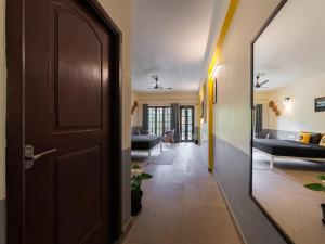 Letto o letti in una camera di The Hosteller Coorg Rainforest, Madikeri
