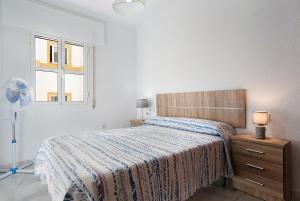 Postel nebo postele na pokoji v ubytování Apartamento Romo