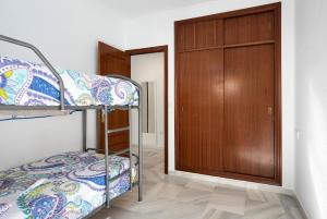 Postel nebo postele na pokoji v ubytování Apartamento Romo