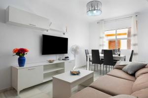 TV a/nebo společenská místnost v ubytování Apartamento Romo