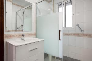 Koupelna v ubytování Apartamento Romo + 20 fotografií