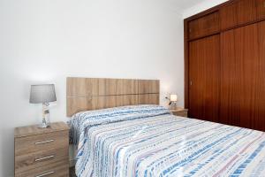 Postel nebo postele na pokoji v ubytování Apartamento Romo