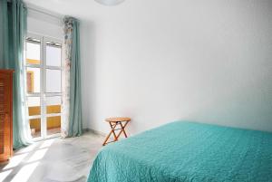 Postel nebo postele na pokoji v ubytování Apartamento Romo