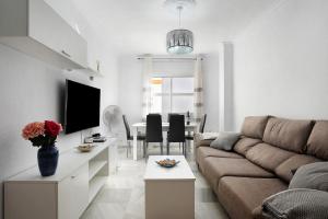 TV a/nebo společenská místnost v ubytování Apartamento Romo