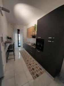 Køkken eller tekøkken på B&B De Matha House