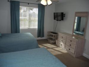 Postel nebo postele na pokoji v ubytování 406M condo