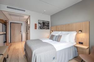 Postel nebo postele na pokoji v ubytování Quality Hotel Harstad