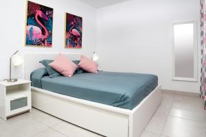 En eller flere senge i et værelse på Sugarsand Senator + 23 billeder