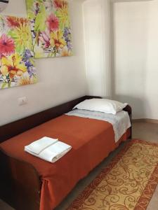 Кровать или кровати в номере La tua casa a Matera