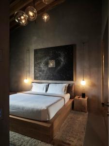 Letto o letti in una camera di Fornace Suite