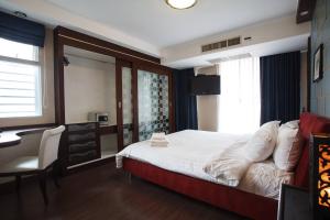 Postel nebo postele na pokoji v ubytování 4C-25BRs3bathAS Downtown Bangkok Near BtsMrt + 29 fotografií