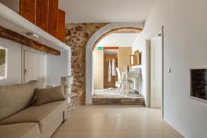 a living room with a couch and a table at Casa Rural Lliber in Lliber