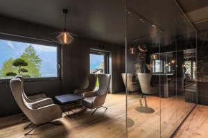 Khu vực ghế ngồi tại Hotel Chalet Al Foss