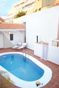 a swimming pool on the roof of a building at Villa Casa Blanca in Adeje