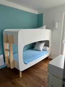 Łóżko lub łóżka w pokoju w obiekcie La Villa B