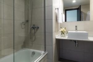 Bilik mandi di Vivaldi Hotel Loft Punta Carretas