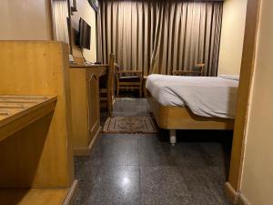 TV a/nebo společenská místnost v ubytování ASR Guesthouse