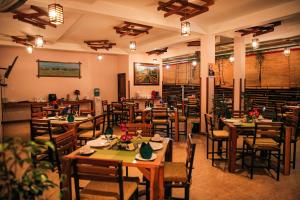 Um restaurante ou outro lugar para comer em O2 Ella