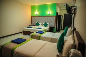 Uma cama ou camas num quarto em O2 Ella