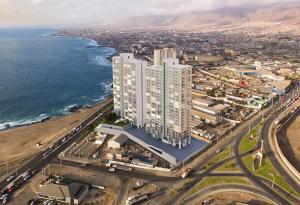 una vista aerea di una città vicino all'oceano di Departamento con vista al mar ad Antofagasta