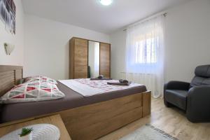 Postel nebo postele na pokoji v ubytování Apartment Buddy