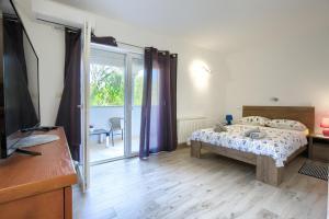 Postel nebo postele na pokoji v ubytování Apartment Buddy